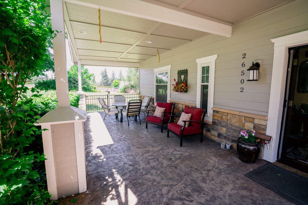 A serene moment of care: hands offering support, symbolizing the compassionate services at Green Meadow Care.